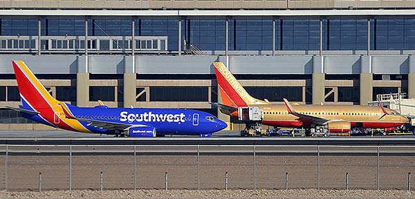 Southwest Boeing 737-7H4s N708SW and N711HK, Phoenix Sky Harbor, December 22, 2014